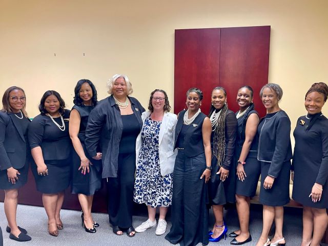 Photo of Brianne K Nadeau meeting with representatives from National Coalition of 100 Black Women