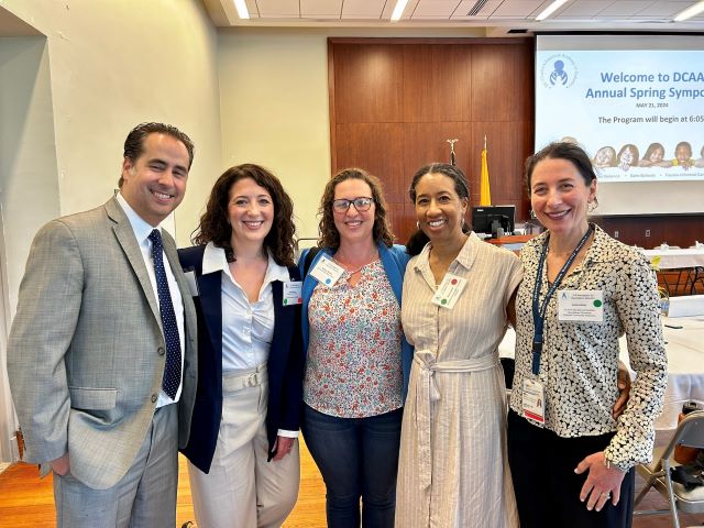 Councilmember Brianne Nadeau poses in a photo with attendees of the American Academy of Pediatrics symposium.