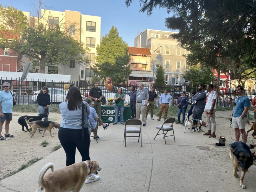 People and dogs gather at 11th and Bark location for dog park community kick off meeting