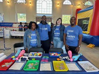 EmpowerEd representatives wearing blue t-shirts