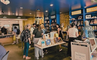 Interior of a bookstore with people shopping