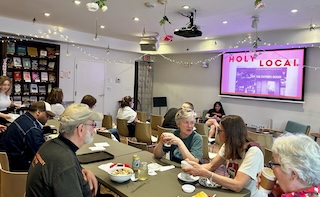 Interior of a bookstore cafe with people conversing