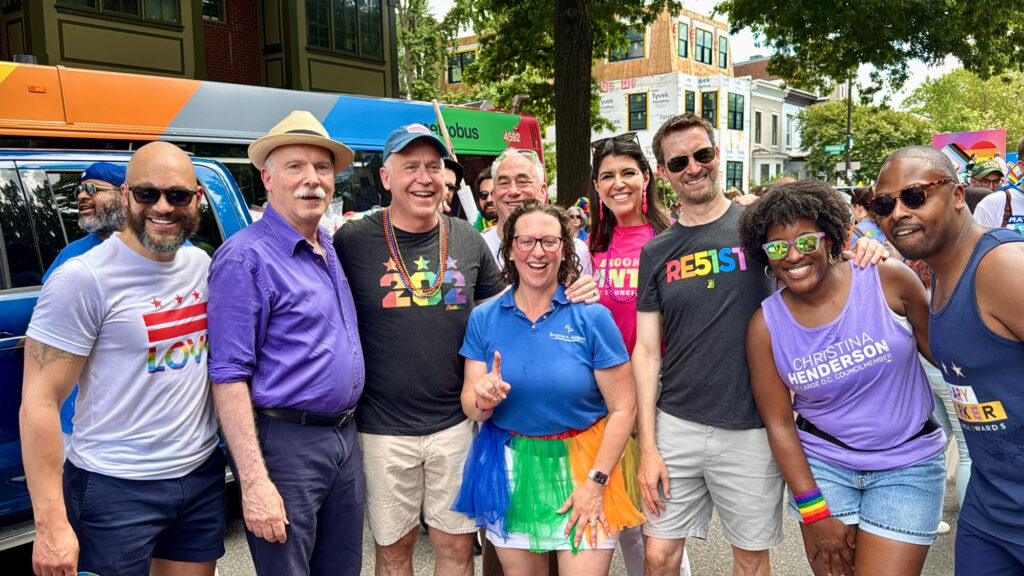 Members of the DC Council pose for a photo at the World Pride Parade in DC
