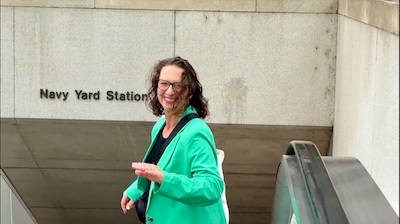 Councilmember Brianne K Nadeau about to ride the escalator at Navy Yard Metro Station