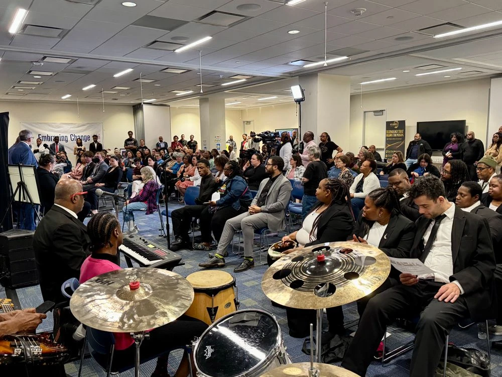 Large seated audience.